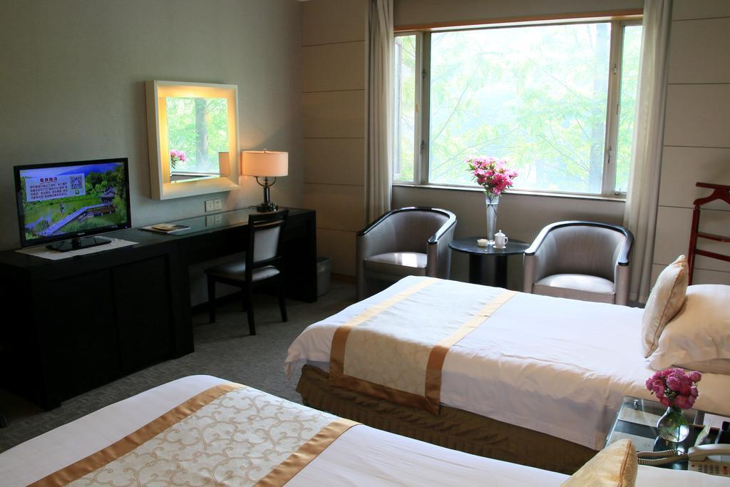 International Conference Hotel Of Nanjing Нанкін Номер фото