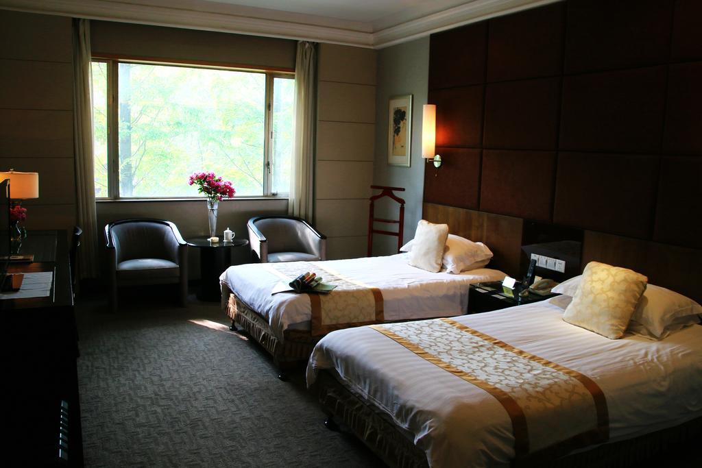 International Conference Hotel Of Nanjing Нанкін Номер фото